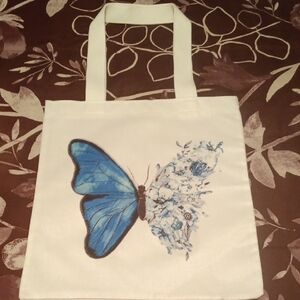 Chic White Tote with Blue Butterfly Design